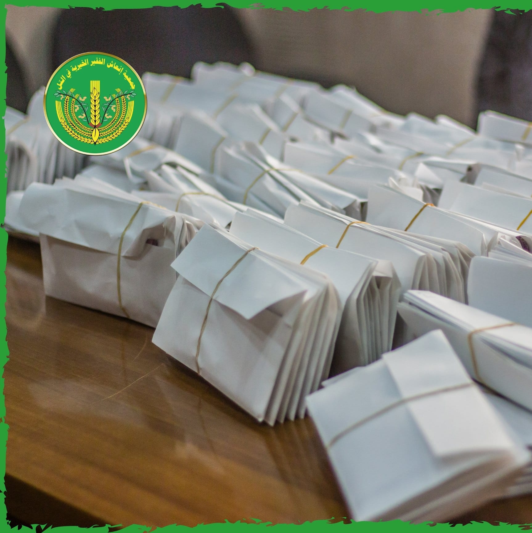 لانتهاء من توزيع المساعدات المالية والعينية للشهر الثامن